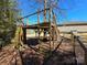 Elevated treehouse playset with climbing wall at 1627 Peden Bridge Rd, Chester, SC 29706