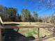 Large backyard with a fire pit and fenced area at 1627 Peden Bridge Rd, Chester, SC 29706