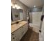 Well-lit bathroom with a tub and modern fixtures at 1627 Peden Bridge Rd, Chester, SC 29706