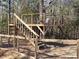 Wooden treehouse with stairs and a climbing wall at 1627 Peden Bridge Rd, Chester, SC 29706