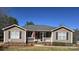 Charming ranch home with front porch and landscaping at 1627 Peden Bridge Rd, Chester, SC 29706