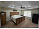 Main bedroom with ceiling fan and large bed at 1627 Peden Bridge Rd, Chester, SC 29706