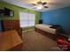 Bright bedroom with wood furniture and a window at 1627 Peden Bridge Rd, Chester, SC 29706