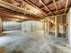 Unfinished basement with exposed framing and poured concrete floor at 14415 Autumncrest Rd # 2, Huntersville, NC 28078