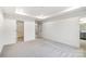 Bright bedroom with carpeted floor and access to a closet and bathroom at 14415 Autumncrest Rd # 2, Huntersville, NC 28078