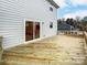 New home features a deck with sliding glass door access at 14415 Autumncrest Rd # 2, Huntersville, NC 28078
