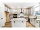 Modern kitchen with gray cabinets, granite countertops, and stainless steel appliances at 14415 Autumncrest Rd # 2, Huntersville, NC 28078