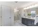 Bathroom with double vanity, large shower, and gray cabinets at 14421 Autumncrest Rd # 3, Huntersville, NC 28078