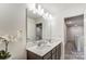 Bathroom with double vanity and gray cabinets at 14421 Autumncrest Rd # 3, Huntersville, NC 28078