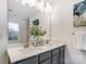 Bathroom with double vanity and gray cabinets at 14421 Autumncrest Rd # 3, Huntersville, NC 28078