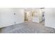 Spacious bonus room with gray carpeting and neutral walls at 14421 Autumncrest Rd # 3, Huntersville, NC 28078