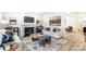 Living room with fireplace, large windows, and comfortable seating at 14421 Autumncrest Rd # 3, Huntersville, NC 28078