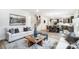 Open concept living and dining area with hardwood floors and modern finishes at 14421 Autumncrest Rd # 3, Huntersville, NC 28078