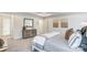 Main bedroom with a queen-size bed and gray carpeting at 14421 Autumncrest Rd # 3, Huntersville, NC 28078