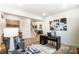 Home office with hardwood floors and access to the kitchen and staircase at 14421 Autumncrest Rd # 3, Huntersville, NC 28078