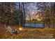 Fire pit area with lake view, perfect for relaxing evenings at 169 Rimmer Farm Rd, Troutman, NC 28166