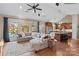 Open concept living room and kitchen with lake view at 169 Rimmer Farm Rd, Troutman, NC 28166