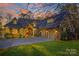 Stunning two-story house with stone accents and a three-car garage at 169 Rimmer Farm Rd, Troutman, NC 28166