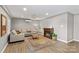Finished basement featuring a cozy fireplace and comfortable seating area at 169 Rimmer Farm Rd, Troutman, NC 28166