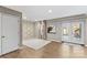 Finished basement room with French doors leading outside and a stylish accent wall at 169 Rimmer Farm Rd, Troutman, NC 28166