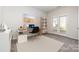 Bright home office featuring a desk, chair, and built-in shelving at 2304 Via Dei Conte Aly, Charlotte, NC 28205