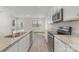 Modern kitchen with stainless steel appliances and granite countertops at 2304 Via Dei Conte Aly, Charlotte, NC 28205