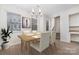 Bright dining room with hardwood floors and modern chandelier at 2304 Via Dei Conte Aly, Charlotte, NC 28205