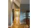 Long hallway with hardwood floors and neutral walls at 2818 Rockford Rd, Shelby, NC 28152