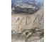 Close-up of an old mill stone with markings at 2818 Rockford Rd, Shelby, NC 28152