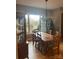 Bright dining room with wooden table and view to backyard at 2818 Rockford Rd, Shelby, NC 28152