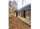 Rustic wooden barn with weathered exterior and damaged windows at 2818 Rockford Rd, Shelby, NC 28152