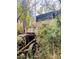 Historic mill with water wheel and stone structure nestled in nature at 2818 Rockford Rd, Shelby, NC 28152