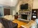 Living area featuring a stunning stone fireplace and hardwood floors at 2818 Rockford Rd, Shelby, NC 28152