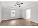 Spacious bedroom with wood-look flooring and ceiling fan at 310 Genell Ln, Rock Hill, SC 29730