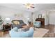 Cozy living room with hardwood floors and comfortable seating at 383 Sweetgum Dr, Fort Mill, SC 29715