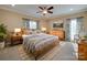 Bedroom featuring a wooden bed frame and farmhouse decor at 7919 Concord Hwy, Monroe, NC 28110