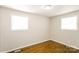 Spacious bedroom with hardwood floors and neutral walls at 974 Sylvia Cir, Rock Hill, SC 29730
