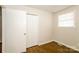 Simple bedroom with hardwood floors and double door closet at 974 Sylvia Cir, Rock Hill, SC 29730