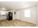 Updated kitchen with white cabinets and black appliances at 974 Sylvia Cir, Rock Hill, SC 29730
