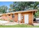 Brick house exterior with backyard, storage shed, and patio at 974 Sylvia Cir, Rock Hill, SC 29730