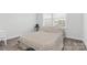 Bedroom with a double bed and geometric patterned bedding at 113 Dublin Ct, Statesville, NC 28677