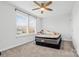 Bright bedroom with double bed, ceiling fan, and window blinds at 113 Dublin Ct, Statesville, NC 28677