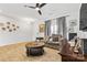Living room with hardwood floors, fireplace, and comfy couch at 113 Dublin Ct, Statesville, NC 28677