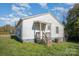 White house with steps and small porch at 130 E Branch Ave, Shelby, NC 28152