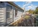 Small back patio with access from the house at 130 E Branch Ave, Shelby, NC 28152
