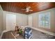 Bedroom with wood paneled ceiling and grey flooring at 130 E Branch Ave, Shelby, NC 28152