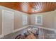 Bedroom with wood paneled ceiling and grey flooring at 130 E Branch Ave, Shelby, NC 28152