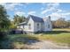White sided home with a deck and a large backyard at 130 E Branch Ave, Shelby, NC 28152