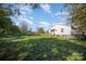 White house with grassy yard at 130 E Branch Ave, Shelby, NC 28152