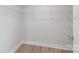 Walk-in closet with wire shelving for ample storage at 135 Beacon Dr # D, Mooresville, NC 28117